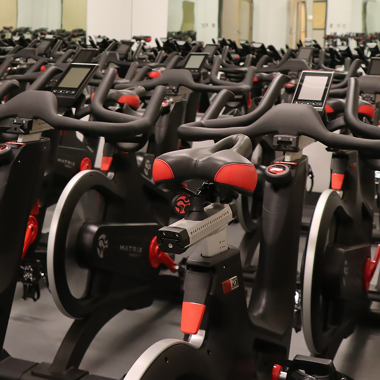 A room full of indoor bicycles.