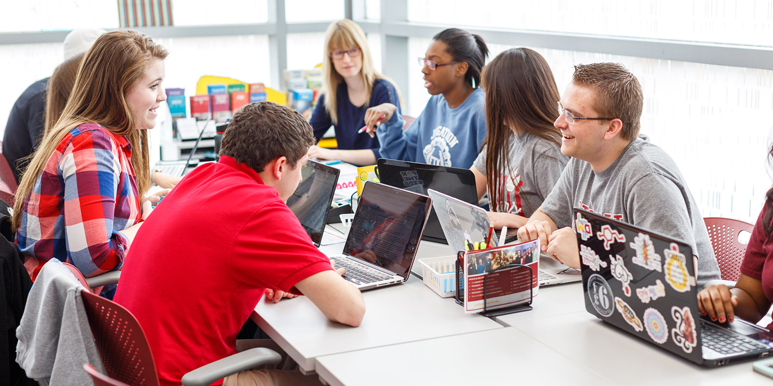 Students gather in the cube.