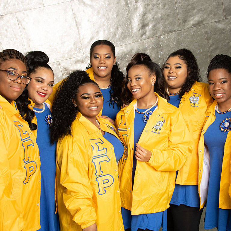 Members of Sigma Gamma Rho pose for a photo together.