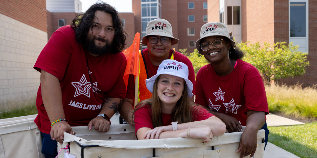 Housing team members pose for a picture on move in day.